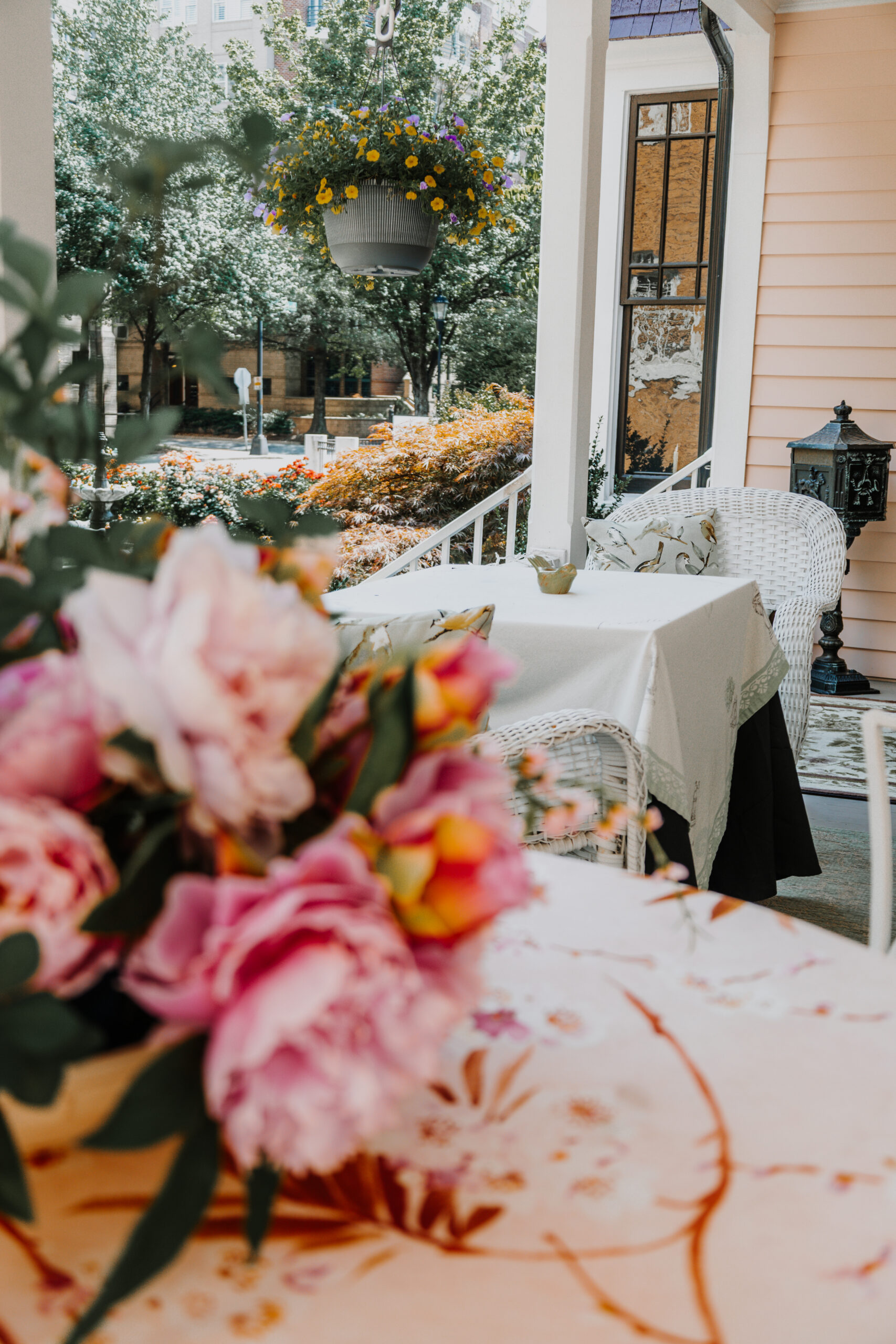 McNinch House front veranda with floral centerpiece