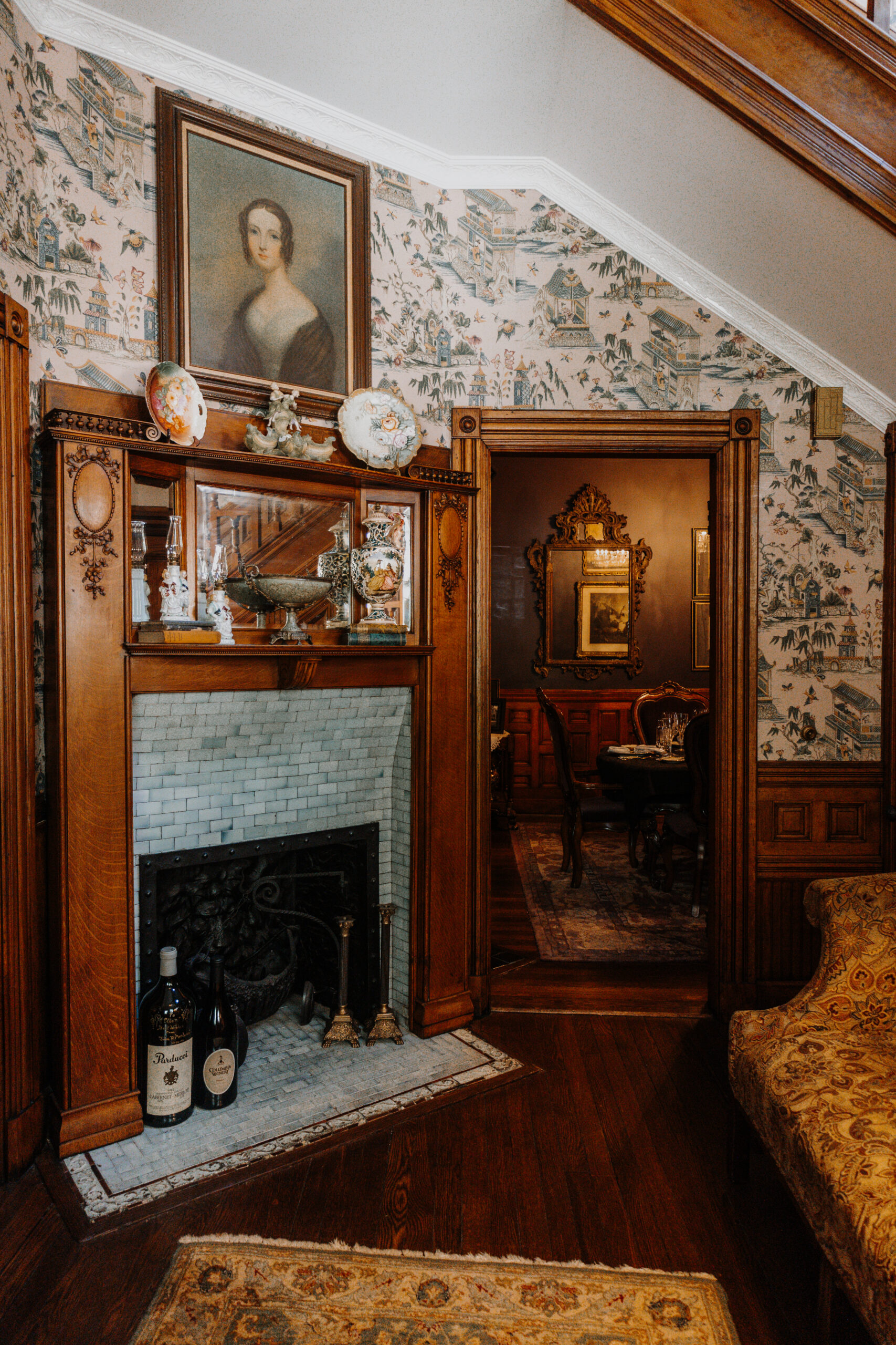 Private Events McNinch House entryway with fireplace and antique mantle